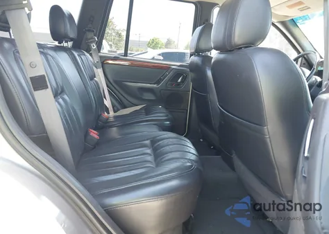 1999 Jeep Grand Cherokee Limited from USA, damaged, VIN 1J4GW68S9XC666797